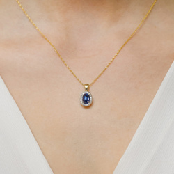 Zawieszka złota T-0574 próby 0,585 z brylantem i szafirem 0,70ct