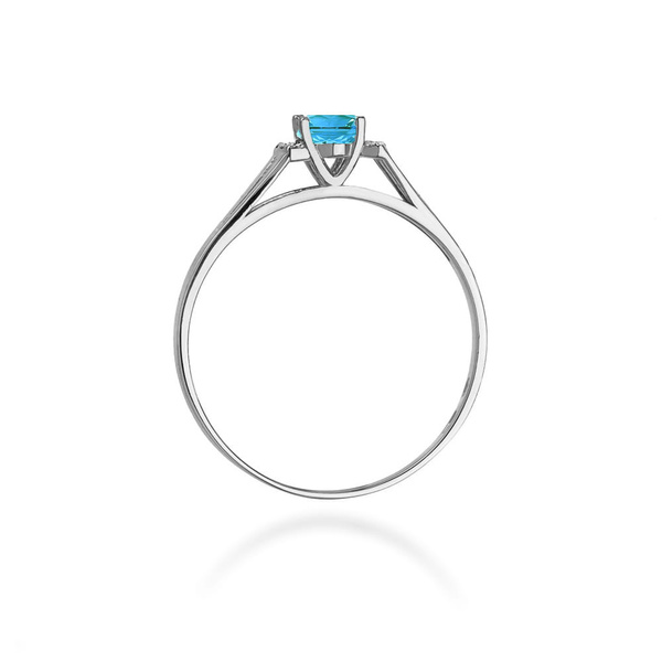 Pierścionek w białym złocie próby 585 model T-5 topaz 0,50ct i brylanty 0,05