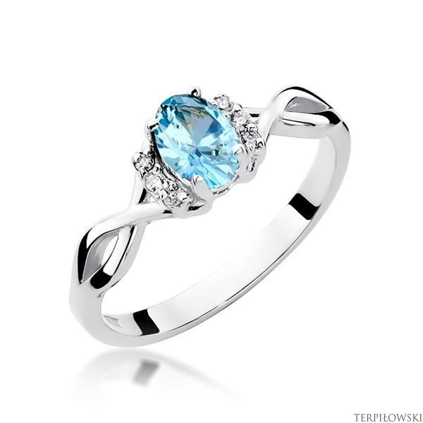 Pierścionek w białym złocie próby 585 model T-19 topaz 0,50ct i brylanty 0,05