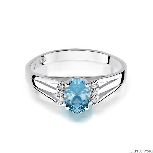 Pierścionek w białym złocie próby 585 model T-5 topaz 0,50ct i brylanty 0,05