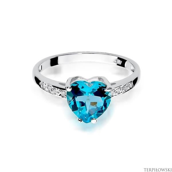 Pierścionek w białym złocie próby 585 model T-31 topaz 1,20ct i brylanty 0,04